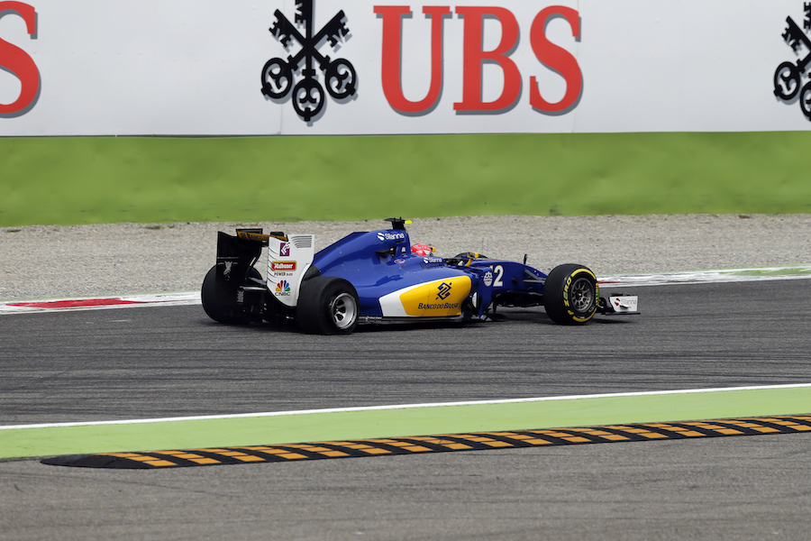 Felipe Nasr with a rear puncture after collision
