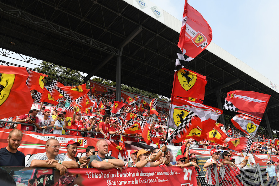 Ferrari fans wave flags