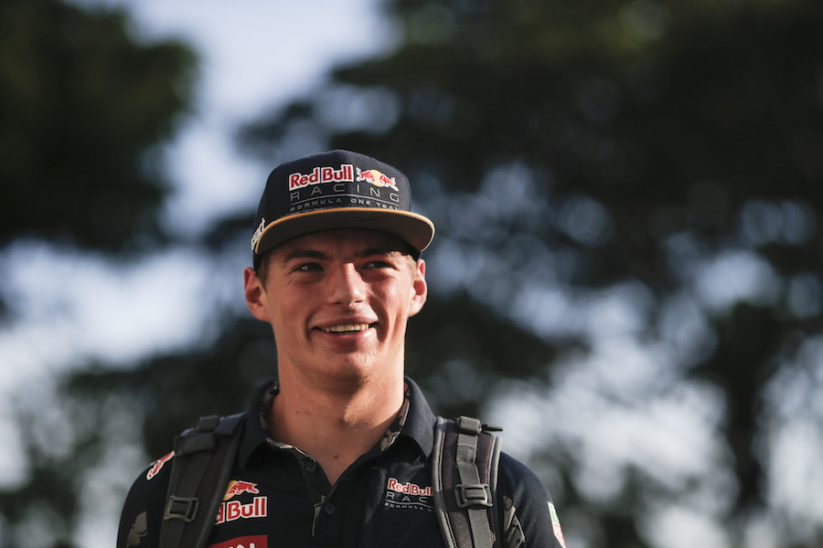 Max Verstappen arrives the paddock with a smile on his face