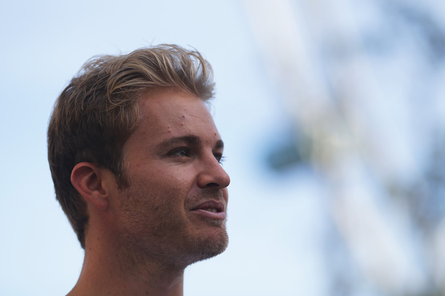 Nico Rosberg relaxes in the paddock