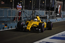 Kevin Magnussen makes his way down the pit lane