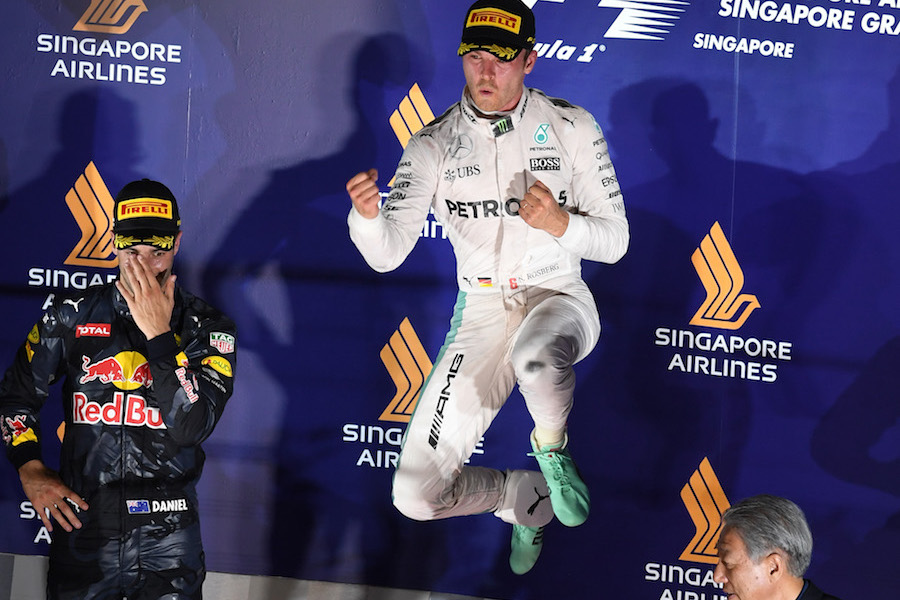 Nico Rosberg celebrates his win on the podium