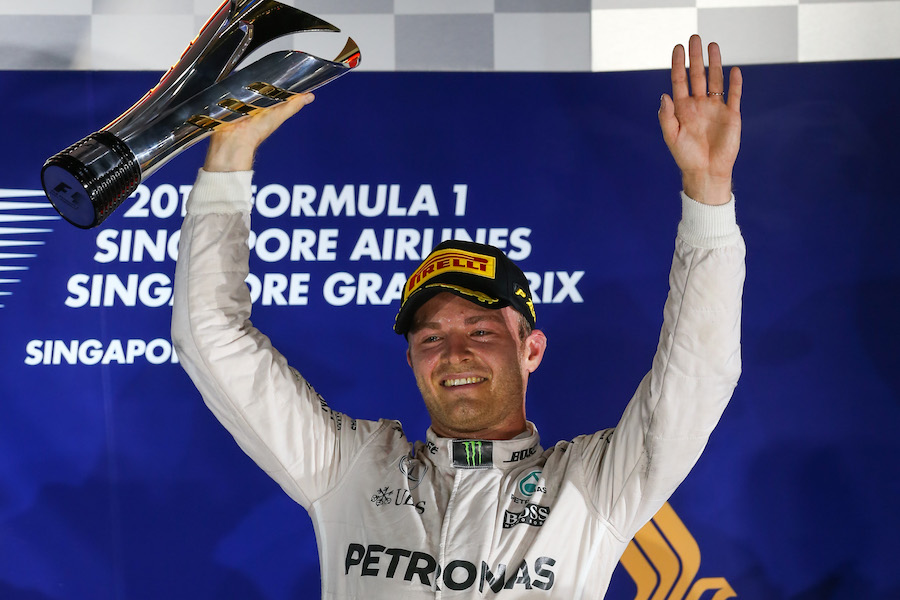 Nico Rosberg celebrates his Singapore victory on the podium