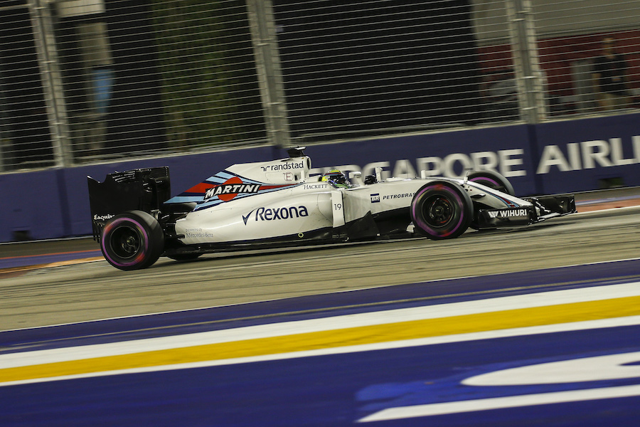 Felipe Massa works hard to keep pace