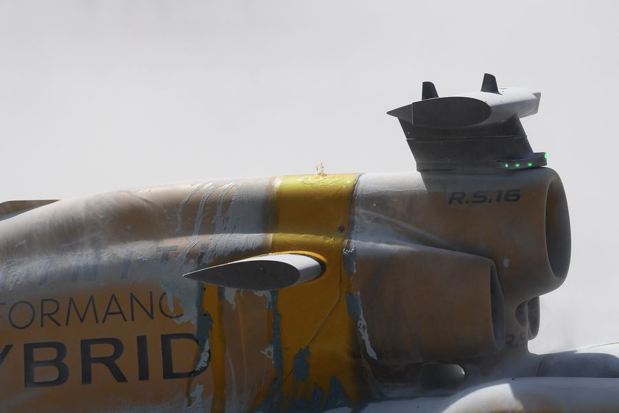 Fuel spews from the Renault of Kevin Magnussen