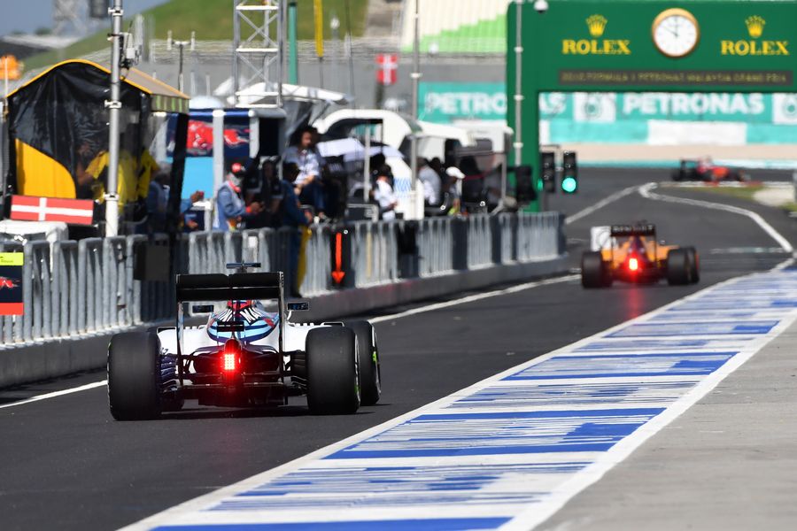 Valtteri Bottas leaves the pitlane for the start of FP1