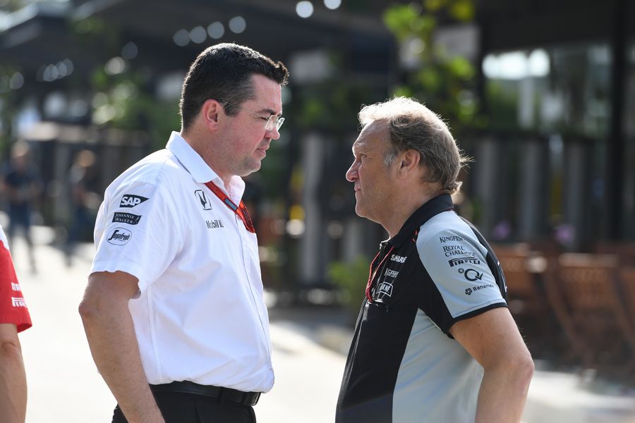 Eric Boullier and Robert Fearnley at the paddock