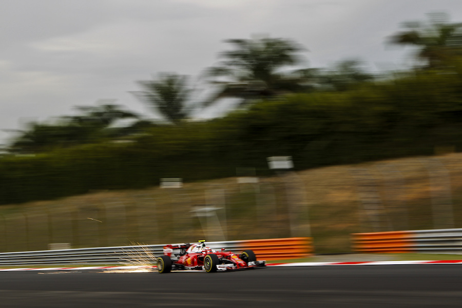 Sparks fly from Kimi Raikkonen's Ferrari