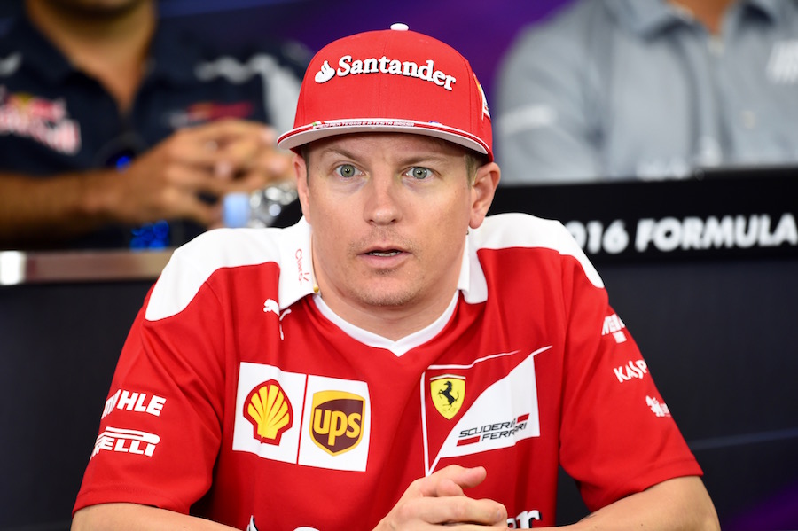 Kimi Raikkonen answers questions from media during the press conference