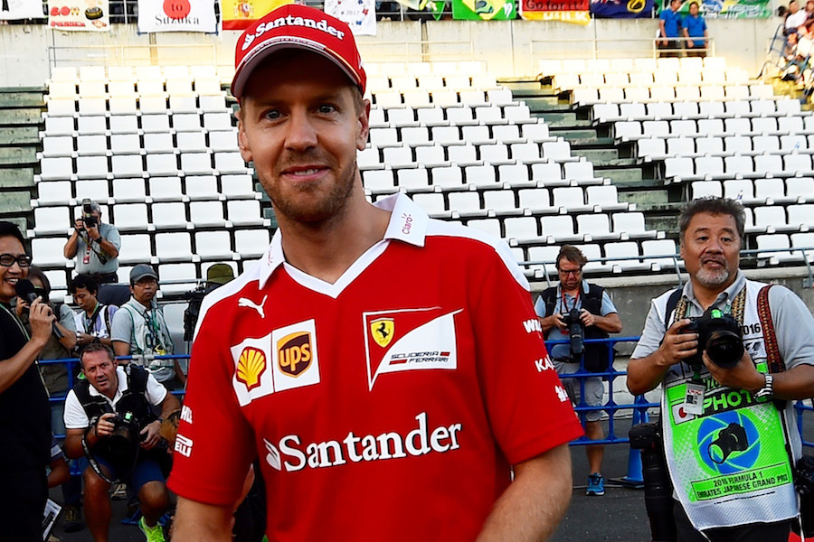 Sebastian Vettel smiles for the photographers