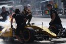 Kevin Magnussen has to get out the car due to the fire