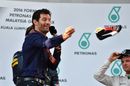 Mark Webber throws Daniel Ricciardo's shoe off the podium