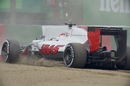 Romain Grosjean takes a trip through the gravel in FP1