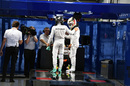 Nico Rosberg and Lewis Hamilton chat in parc ferme after qualifying