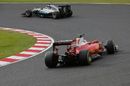 Lewis Hamilton leads Sebastian Vettel