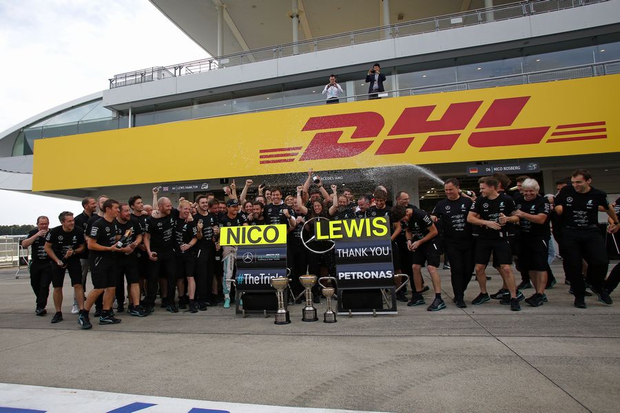 Mercedes mechanics and engineers celebrate the constructors championship