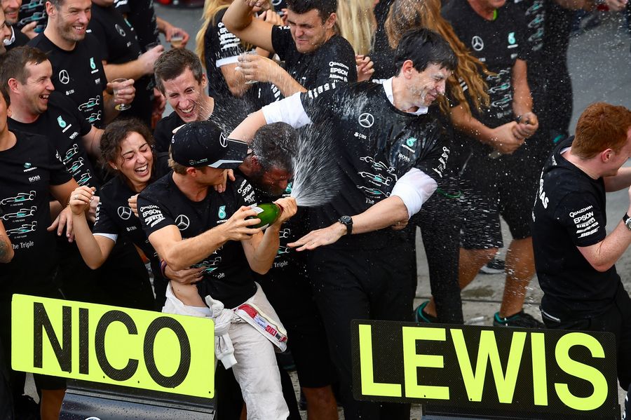 Nico Rosberg and Toto Wolff celebrate with the team