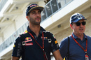 Daniel Ricciardo walks through the paddock