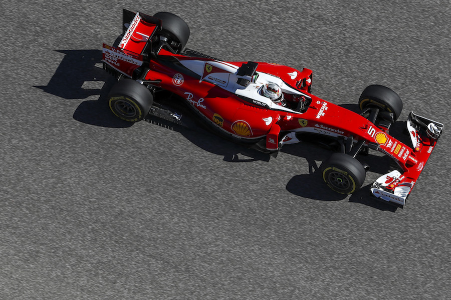 Sebastian Vettel puts the Ferrari through its paces