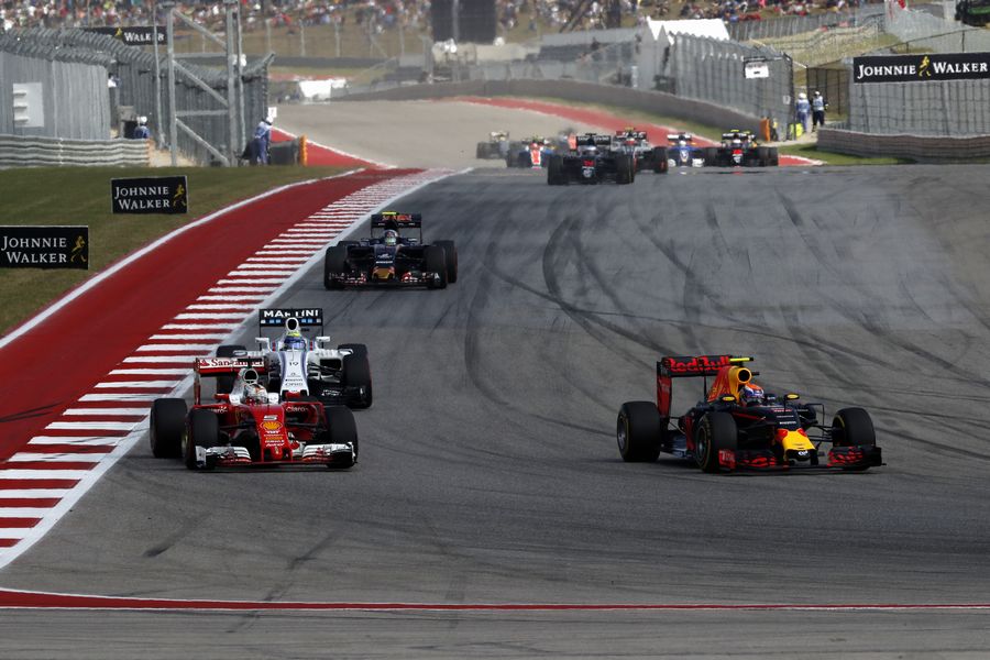 Sebastian Vettel and Max Verstappen battle on the opening lap