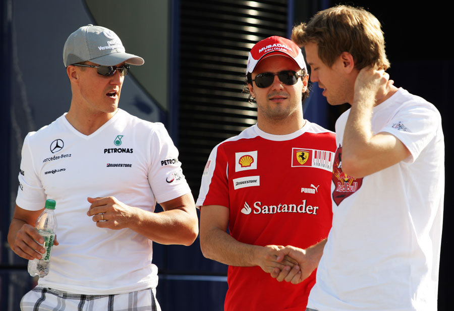 Michael Schumacher, Felipe Massa and Sebastian Vettel swap stories after practice