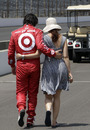 Dario Franchitti walks with his wife, actress Ashley Judd, following the final practice session for the Indianapolis 500
