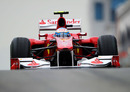 Fernando Alonso exits the pit lane