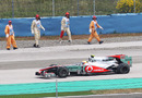 Lewis Hamilton leaves the track after spinning at turn 8