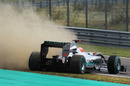Michael Schumacher slides into the gravel at the end of qualifying