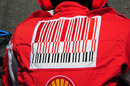 The controversial Marlboro bar-code logo on a Ferrari mechanic