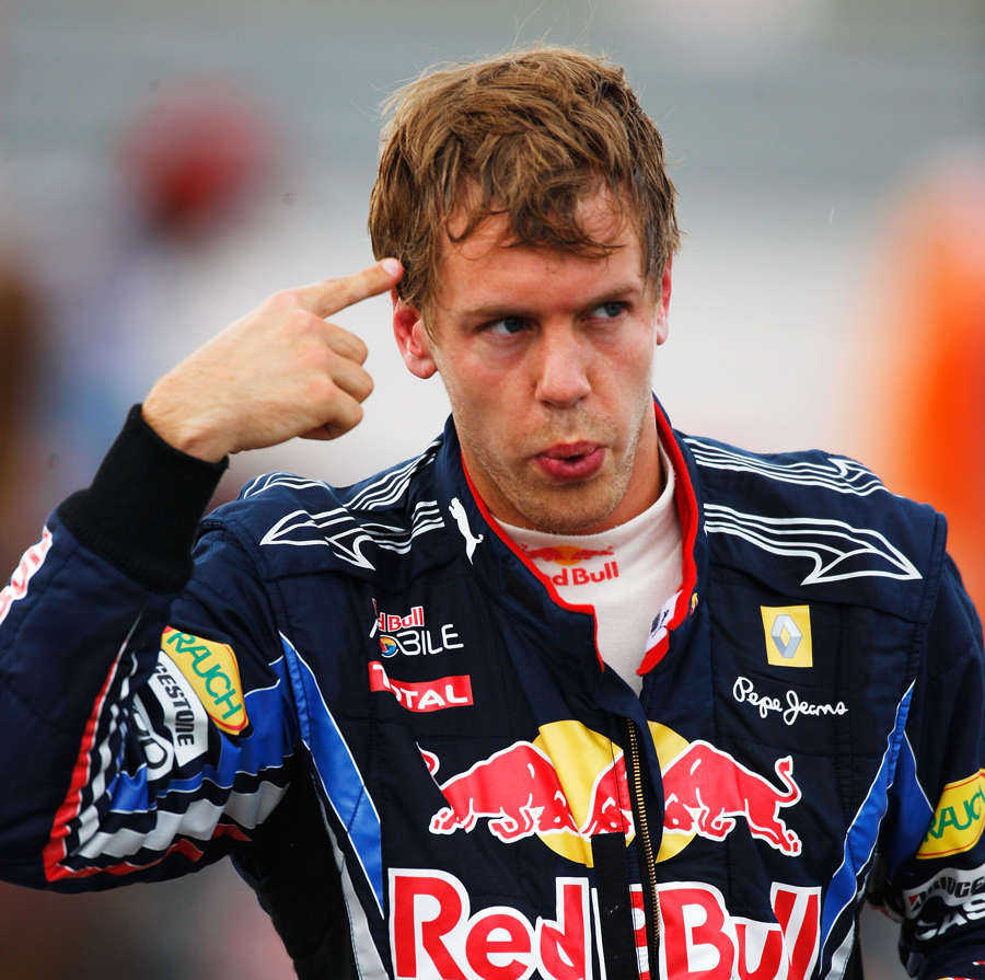 Sebastian Vettel gesticulates after his race was ended 