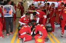 Ferrari mechanics works hard for Kimi Raikkonen's car