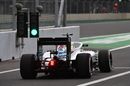 Felipe Massa makes his way down the pit lane with halo
