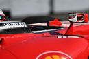 Kimi Raikkonen in the Ferrari cockpit with mirror reflection