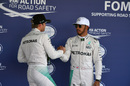 Lewis Hamilton and Nico Rosberg in parc ferme after qualifying