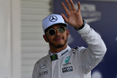 Lewis Hamilton smiles in parc ferme after qualifying