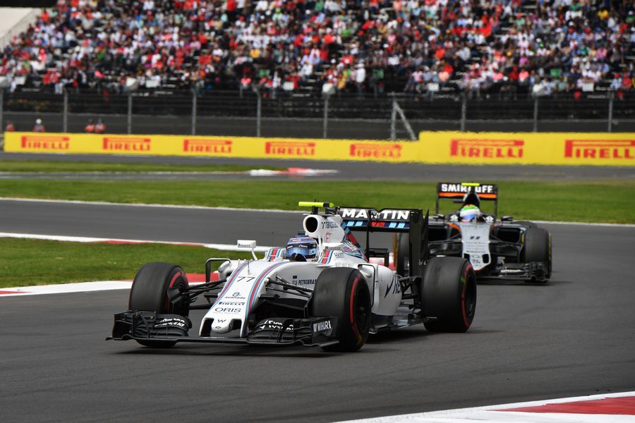 Valtteri Bottas and Sergio Perez battle for a position