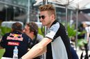 Nico Hulkenberg in the paddock with a smile on his face