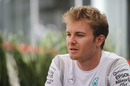 Nico Rosberg speaks to media at the paddock
