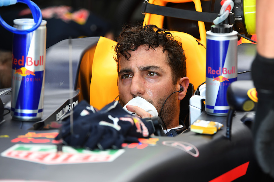 Daniel Ricciardo sits in the Red Bull cockpit