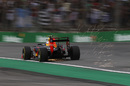 Sparks fly from Max Verstappen's Red Bull
