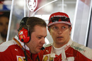 Kimi Raikkonen talks with Ferrari Race Engineer