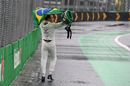 Felipe Massa with Brazilian flag after his crashing out from the race
