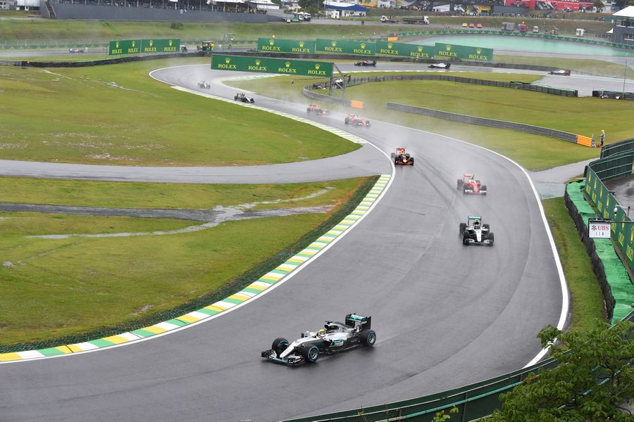 Lewis Hamilton leads the field during the safety car period