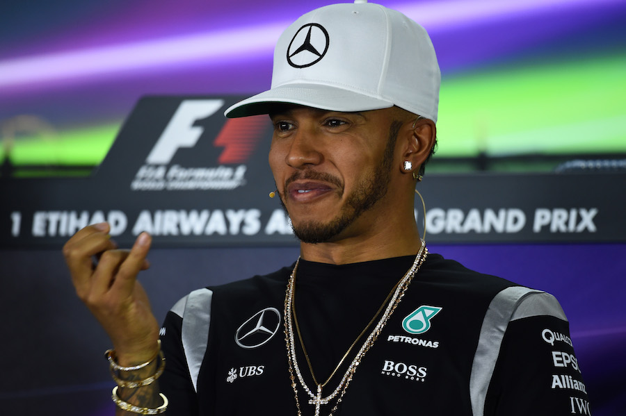 A smiling Lewis Hamilton during the Thursday press conference