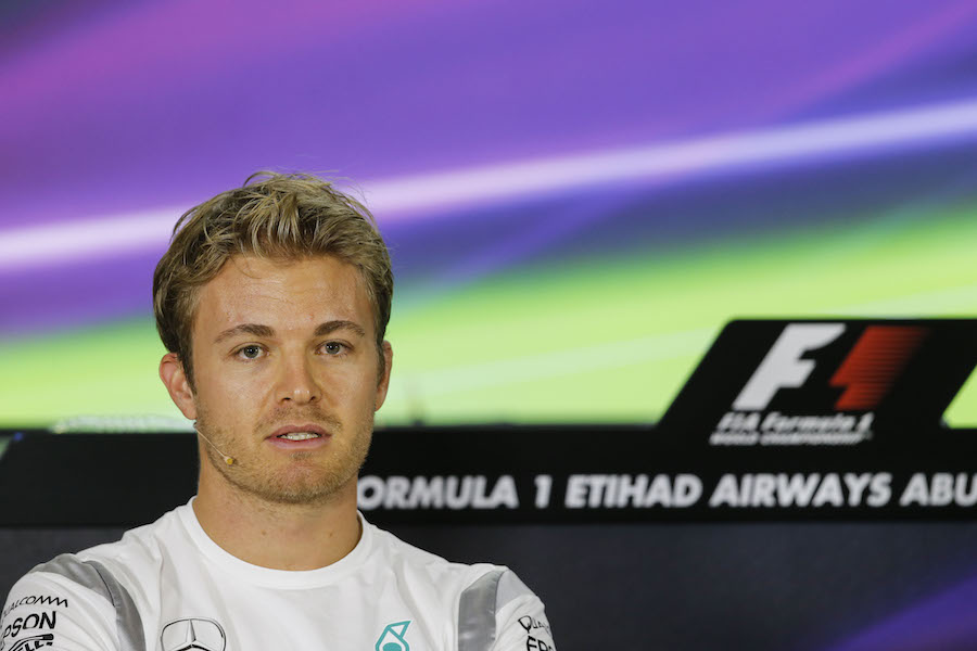 Nico Rosberg talks to media during the press conference