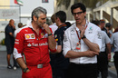 Maurizio Arrivabene and Toto Wolff chat in the paddock