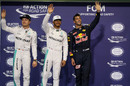The top three drivers wave in parc ferme after qualifying