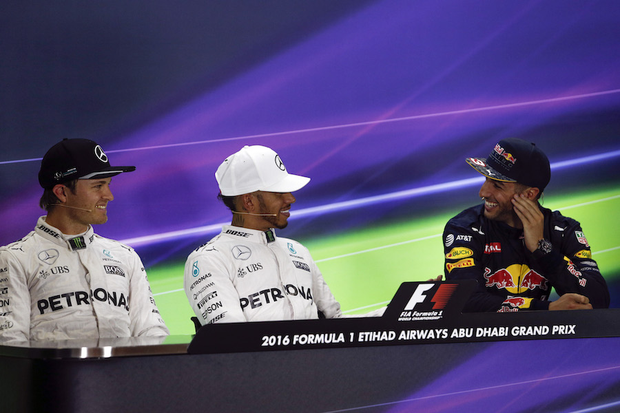 Lewis Hamilton, Nico Rosberg and Daniel Ricciardo smile in the press conference after qualifying