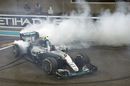 New World Champion Nico Rosberg celebrates at the end of the race with donuts